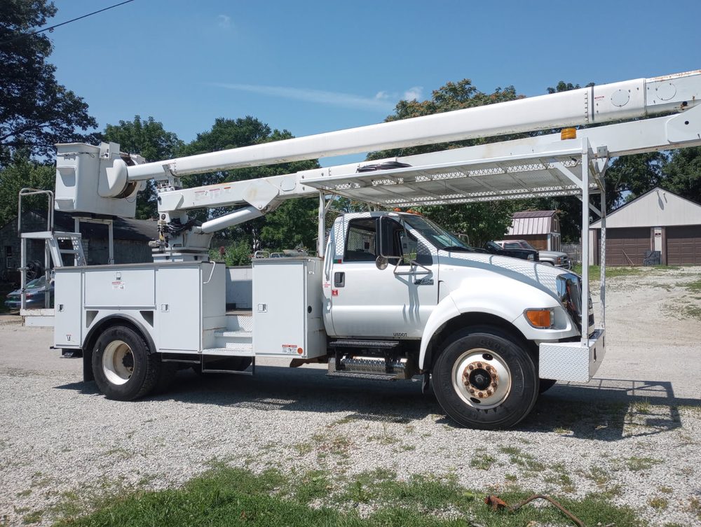 RJ's Tree Care bucket truck parked and ready for the next job